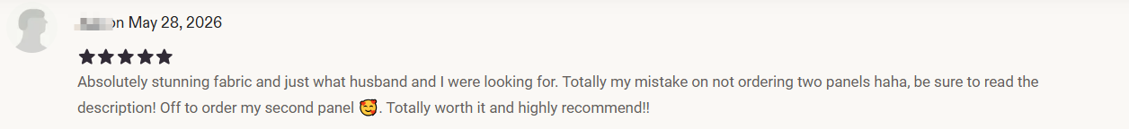 Customer review mentioning stunning fabric and ordering a second lace curtain panel
